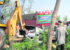The mangled remains of the car that rammed into a truck at Mullanpur Dakha.