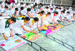 An inter-house painting contest in progress at Greenland Senior Secondary Public School in Ludhiana on Saturday.