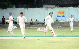 REC Chandigarh batsmen take a run against Indian Air Force at the 27th All-India Uttarakhand Gold Cup Cricket Tournament in Dehradun on Sunday.