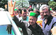 Newly elected MP from Mandi Virbhadra Singh waves to his supporters before leaving for Delhi to meet Congress president Sonia Gandhi, at his residence in Shimla on Sunday.