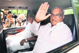 Chief Minister Bhupinder Singh Hooda arrives to meet Congress president Sonia Gandhi at her residence in New Delhi on Sunday.