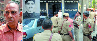 (Left) Vijay Prakash Gupta, a trader, who was robbed on the bank premises. Delhi police personnel carry out inspection outside Bank of India branch at Patparganj in New Delhi on Monday.