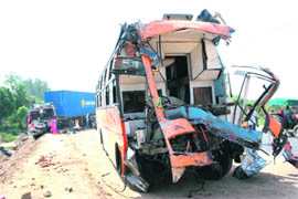 The wreckage of a private bus from Rajasthan that collided head-on with a truck near IMT in Rohtak on Monday.