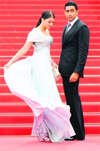 EXIT MODE: Indian model Aishwarya Rai and Abhishek Bachchan left from the Cannes Film Festival to be in Mumbai for election results