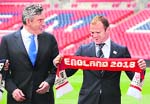 Britains Prime Minister Gordon Brown (L) and footballer Wayne Rooney during the launch of The England 2018 soccer World Cup bid at Wembley on Monday.
