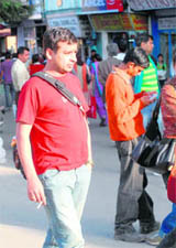 Instead of realising that smoking is banned all over India, a man smokes openly near the Scandal Point in Shimla.