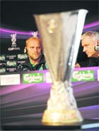 Werder Bremens coach Thomas Schaaf looks past the UEFA Cup trophy at a press meet on the eve of their final with Shakhtar Donetsk on Wednesday in Istanbul.
