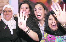(From left) Newly elected members of Kuwaits Parliament, Massouma al-Mubarak, Aseel al-Awadhi, Rola Dashti and Salwa al-Jassar, gesture during a celebration held in their honour in Khaldiya on Wednesday.