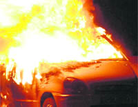 A car that caught fire at Jagraon bridge in Ludhiana on Wednesday night.