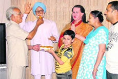 Wax statues of Prime Minister Manmohan Singh and UPA chairperson Sonia Gandhi being unveiled in Ludhiana on Thursday.