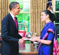 Indian Ambassador to US Meera Shankar presents her credentials to US President Barack Obama during a ceremony at the Oval Office of the White House in Washington on Thursday.