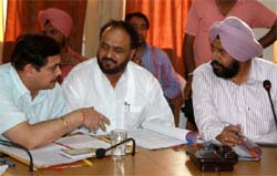 Acting BMC Commissioner Moneesh Kumar (left), Bathinda MLA Harminder Singh Jassi and Mayor Baljeet Singh Bir Behman at the BMC meeting in Bathinda