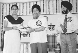 Vice-chancellor of Punjabi University Dr Jaspal Singh gives certificates to students of Mata Sahib Kaur Khalsa Girls College of Education in Patiala on Friday.