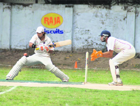 A batsman plays a shot at the 27th All-India Uttaranchal Gold Cup Cricket Tournament in Dehradun on Friday.