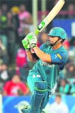 Adam Gilchrist plays a shot during their match against Delhi Daredevils in Pretoria 