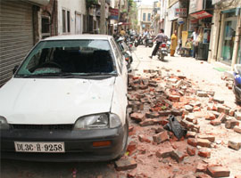 Bricks lie scattered at a place near Company Bagh Chowk where a youth died after a parapet collapsed due to a windstorm in Jalandhar on Saturday.