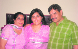 Mishika Chaudhary with parents