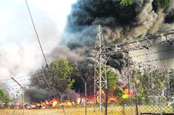 Flames engulf a power grid in the Kotkapura subdivision of Faridkot