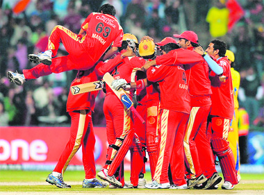 Royal Challengers Bangalore players celebrate their victory at The Wanderers Cricket Stadium in Johannesburg on Saturday.