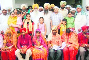 The poor girls who were married off by the Swami Chetanya Ji Trust at Gurdwara Singh Sabha, Brahampur, on Sunday