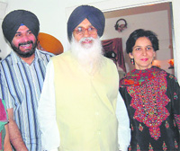 CM Parkash Singh Badal (centre), with BJP MP Navjot Singh Sidhu and his wife Dr Navjot Kaur, at their residence in Amritsar on Saturday.