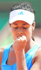 Ana Ivanovic reacts after winning 7-6, 6-3 against Sara Errani on Sunday.