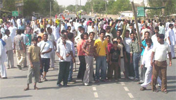 Protesters block the traffic near Sanjeev Cinema in Fazilka to protest against the violent incident in Vienna