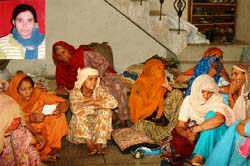 Wailing relatives of Sudesh (inset), who was shot by two armed attackers at Naharpur Rupa in Gurgaon on Monday