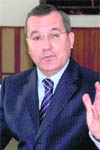 Dr Peter McLaughlin addresses mediapersons in Dehradun on Monday.