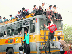 An overcrowded bus in Nuh.