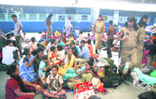 Passengers stranded at Jammu railway station on Monday after the cancellation of trains following violent incidents in Punjab and Haryana over the killing of a sect leader in Austria.