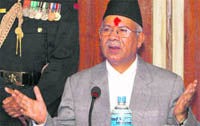  Nepals new PM Madhav Kumar Nepal addresses officials in Kathmandu on Monday.