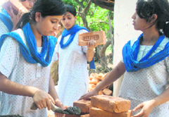 Welhams girls building toilets at Ambiwala.