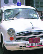 The official car of the ADC, Muktsar, that was damaged by protesters.