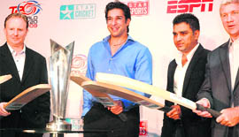 Former Pakistan captain Wasim Akram (L) and former India player Sanjay Manjrekar during the unveiling of the ICC T20 World Cup trophy in New Delhi on Tuesday.