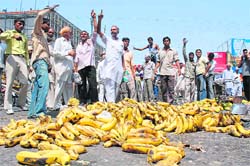 Hawkers hold a protest against an anti-encroachment drive outside the bus stand in Karnal 