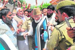 The police arrests chairman of the Hurriyat Conferences hardline fraction Syed Ali Shah Geelani after he tried to defy his house arrest in Srinagar 