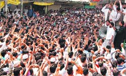 Hurriyat Conference chairman Mirwaiz Umar Farooq addresses a public rally at Pulwama