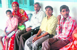 Patients wait at the Rishikul Medical College unaware of the strike by junior doctors in Haridwar on Saturday.