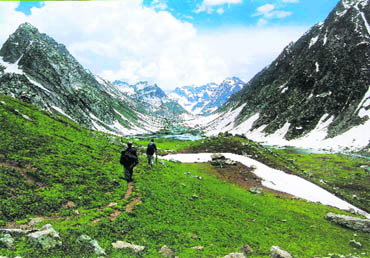 A view of the Kundol lake in the Swat Valley. The valley, which looks like a a camels hump, is surrounded by the Mt Godwin Austen or K-2, Nanga Parbat, Masherbrum and the Rakaposhi