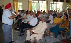 DLF residents attend a meeting held by GURM in Gurgaon