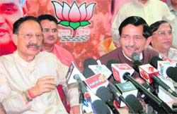 CM BC Khanduri and BJP chief BS Rawat address the media in Dehradun