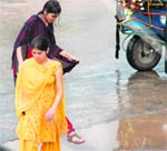 Girl caught in a shower in Haridwar 