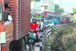 TRAPPED: A traffic jam on a busy road in Gurgaon. Scenes like this are common in the millennium city