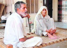 Sher Singh and his mother Bhagirati, residents of Bhani Khurd village in Karnal district