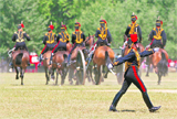 The Kings Troop Royal Horse Artillery leaves after firing a 41-gun salute to mark the Queens Coronation anniversary at Hyde Park in London on Tuesday.