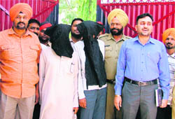 The accused in police custody.