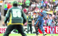 Rohit Sharma plays a shot against Pakistan in their warm up match at the Oval