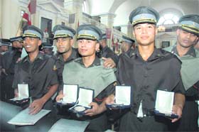 Winners display their medals at the graduation ceremony of the 93rd course of the Army Cadet College Wing of Indian Military Academy at Chetwode Hall in Dehradun