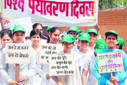 Schoolchildren hold an awareness rally on World Environment Day in Karnal 